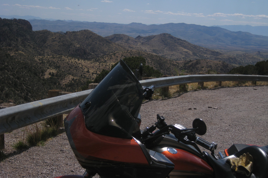 That's Arizona in the background - New Mexico is just a mile away. The other side of the mountain has 80 foot pine trees everywhere - not a cactus in site.