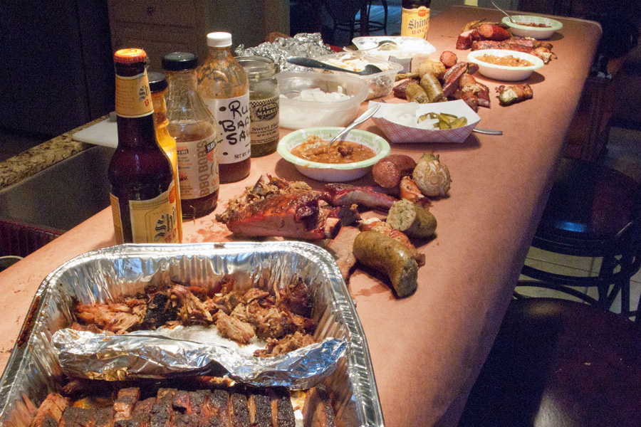 Brisket, Pulled Pork, Ribs, Boudin Sausage, Venison Sausage, Baked Beans, Jalapeno Poppers wrapped in Bacon.  Only thing missing was a wheel chair because I was too full to walk!!