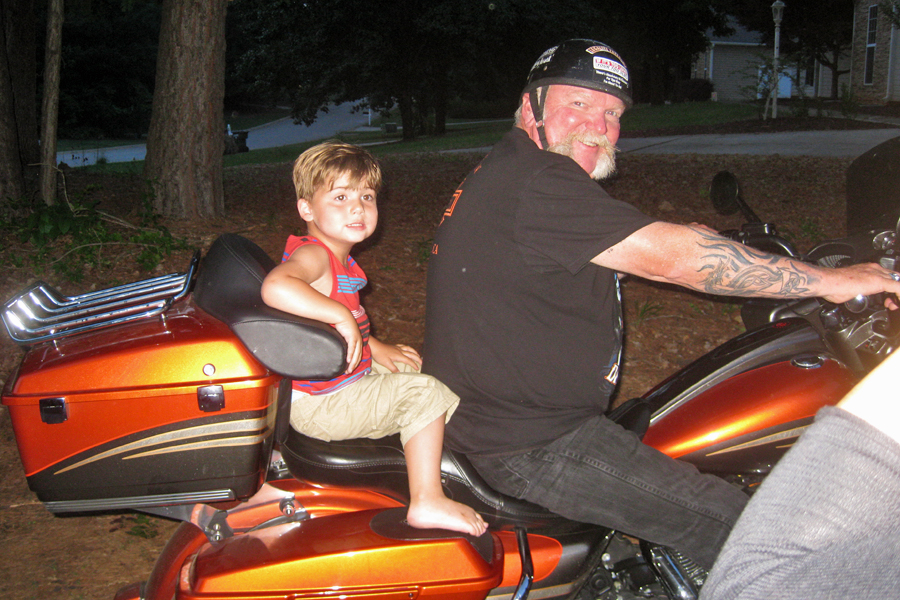 Evan - Sara's son. Still a little young for a real ride but he got to climb aboard.