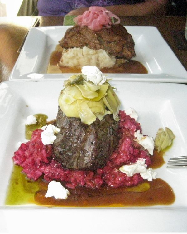 My fillet on a bed of roasted beet risotto with artichoke hearts on top & some kind of cheese all around.  Robin's meatloaf on a bed of cauliflower mashed potatoes topped with pickled onions.