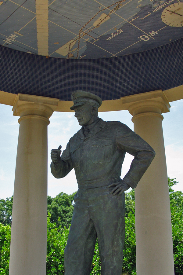 General Eisenhower with a depiction of the assault map overhead.  This sculpture is so detailed that you can read the writing on his class ring. 